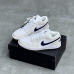 کفش نایک ایر جردن وان لو شیری تیک سرمه‌ای Nike Air Jordan 1 Low Cream Navy Swoosh